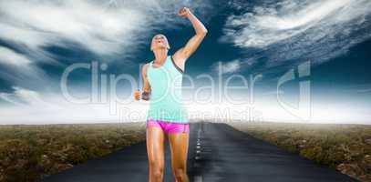 Composite image of sportswoman celebrating her victory