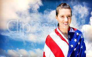 Composite image of portrait of happy american sportswoman is smi