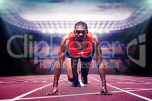 Composite image of athlete man in the starting block