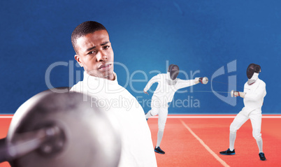 Composite image of swordsman practicing with fencing sword