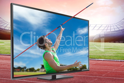 Composite image of athletic man throwing a javelin