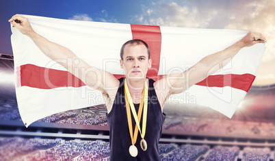 Composite image of athlete with olympic gold medal around his ne