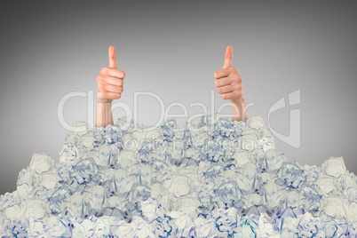 Composite image of businesswomans hands showing thumbs up