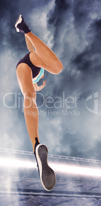 Composite image of female athlete jumping