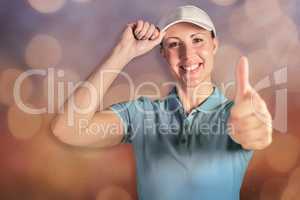 Composite image of sportswoman posing on black background