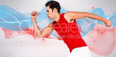 Composite image of male athlete running on white background