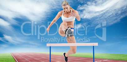 Composite image of female athlete jumping