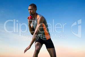 Composite image of athlete man concentrating during his shot put