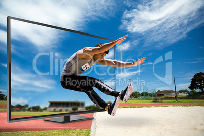 Composite image of portrait of sportsman jumping