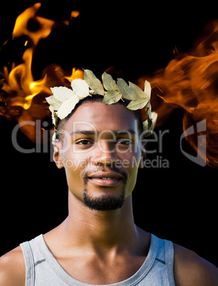 Composite image of portrait of victorious sportsman with crown of laurels