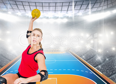 Female athlete throwing handball