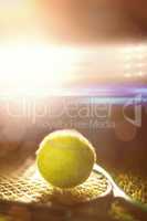 Close up of tennis ball and racket