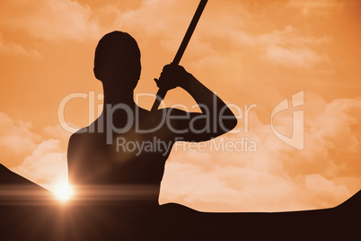 Composite image of woman sporty posing with her javelin