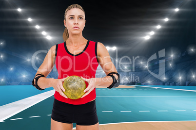 Composite image of female athlete with elbow pad holding handbal