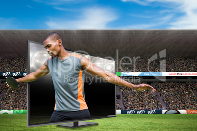 Composite image of front view of sportsman practising discus thr