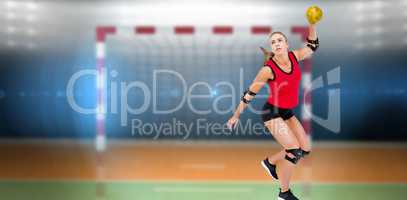 Female athlete with elbow pad throwing handball