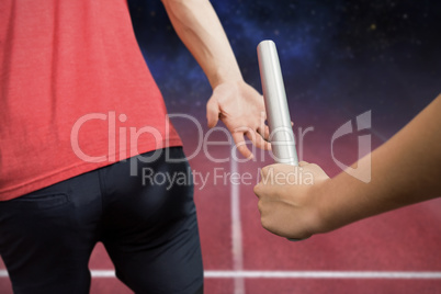 Composite image of sportswoman running on a white background