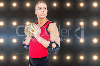 Composite image of female athlete with elbow pad holding handbal