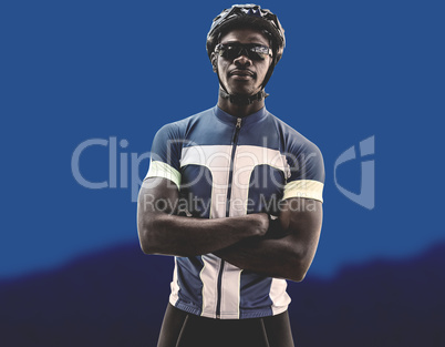 Composite image of cyclist crossing his arms