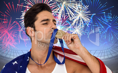 Composite image of athlete kissing gold medal after victory with