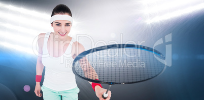 Composite image of female athlete playing badminton