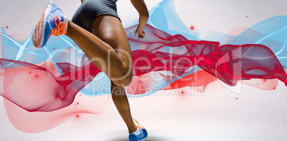 Composite image of sporty woman finishing her run