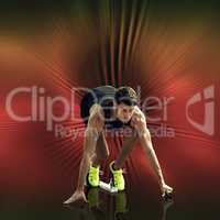 Composite image of sportsman waiting on the starting block