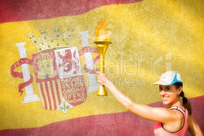 Composite image of happy woman raising a cup