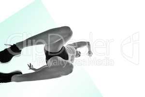 Composite image of low angle female athlete jumping