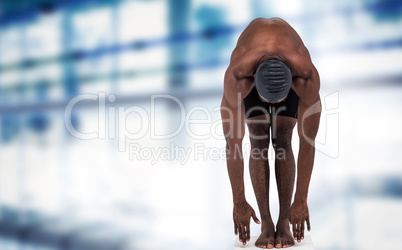 Composite image of swimmer ready to dive