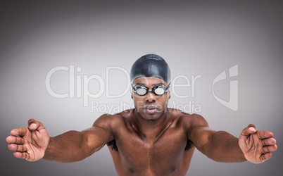 Composite image of swimmer ready to dive