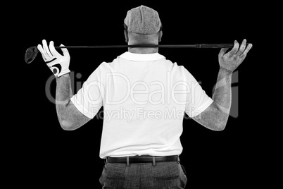 Composite image of rear view of golf player holding a golf club