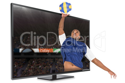 Composite image of sportsman posing while playing volleyball