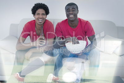 Composite image of friends are watching sport on television with