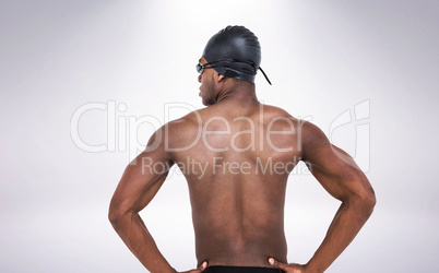 Composite image of rear view of swimmer on white background