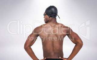 Composite image of rear view of swimmer on white background