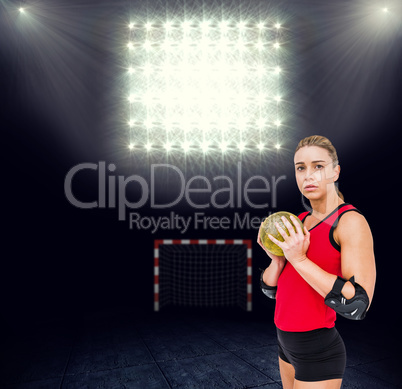 Composite image of female athlete with elbow pad holding handbal