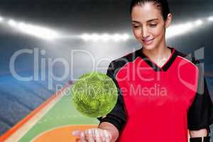 Composite image of female athlete posing with elbow pad