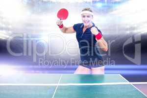 Composite image of female athlete is winning a ping pong match