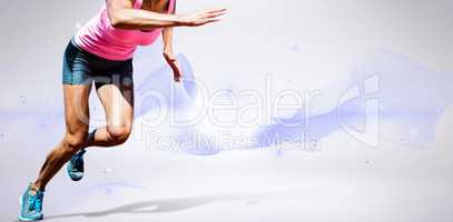 Composite image of sportswoman running on a white background