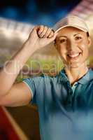 Composite image of sportswoman posing on black background