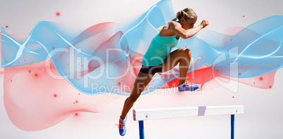 Composite image of athlete woman jumping a hurdle