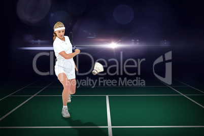 Composite image of badminton player playing badminton