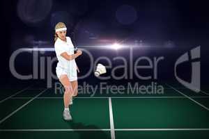 Composite image of badminton player playing badminton