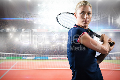 Concentrated sportswoman playing tennis