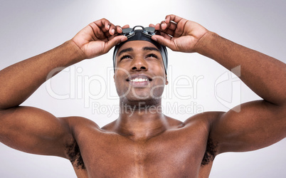 Composite image of swimmer ready to dive