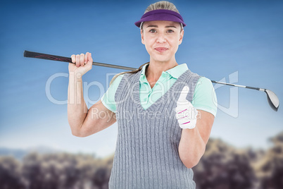 Composite image of pretty blonde playing golf and showing a thum