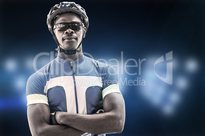 Composite image of cyclist crossing his arms