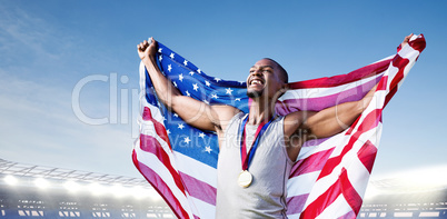 Composite image of portrait of american sportsman is smiling for