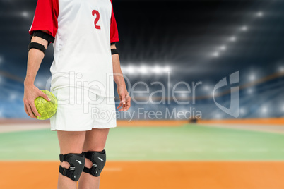 Sportswoman holding a ball